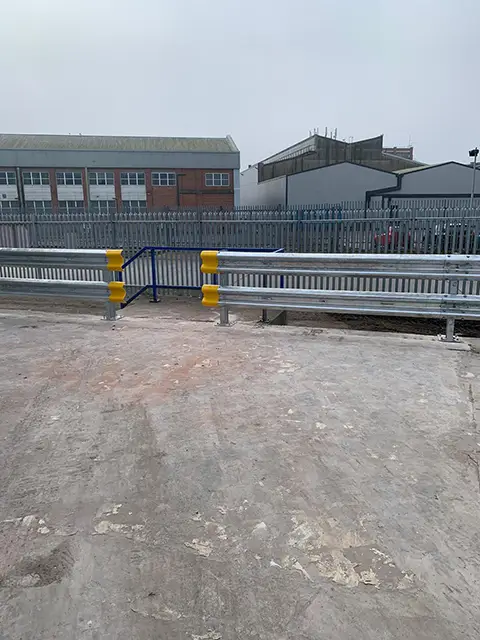 Crash barrier installed at an industrial car park by DT Services Ltd